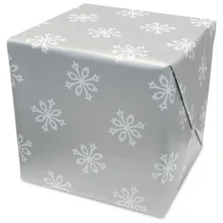 Julklappspapper Snöstjärnor
